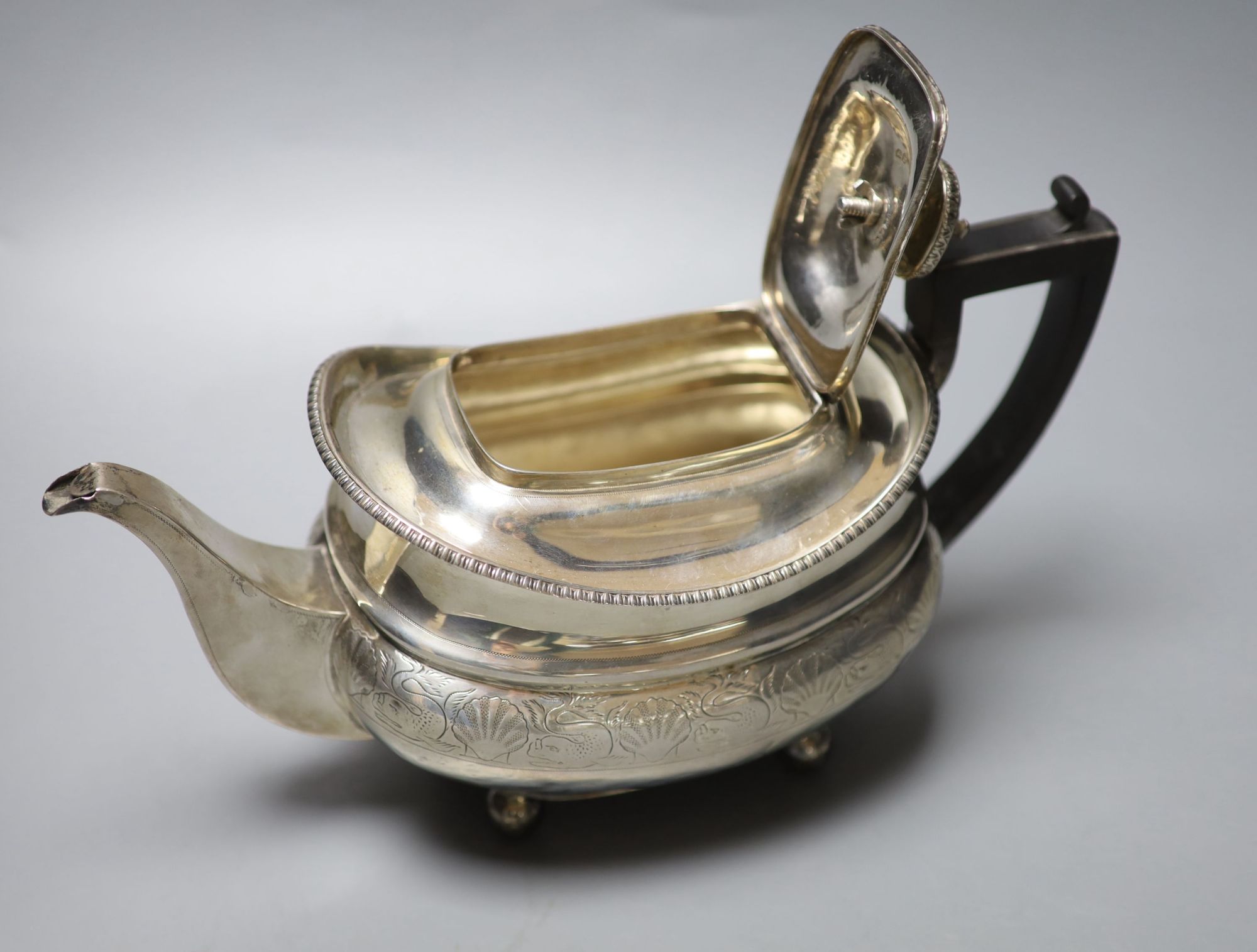 A George III silver ovoid teapot, London, 1813, gross 18oz,